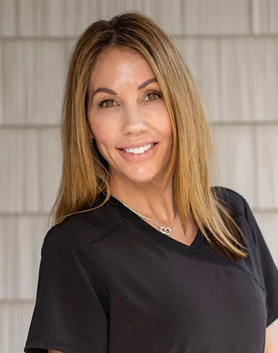 a woman smiling at camera